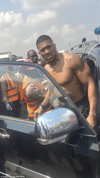 Breaking: Anthony Joshua Survives Nigeria Car Crash, Pays Respect to Killed Friends in Emotional Visit
