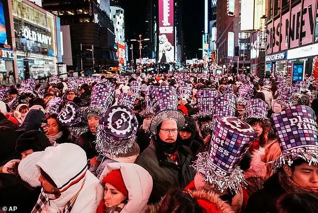 Festive Spirits Shine in Times Square as Thousands Celebrate New Year's Eve Amid Cold Temperatures