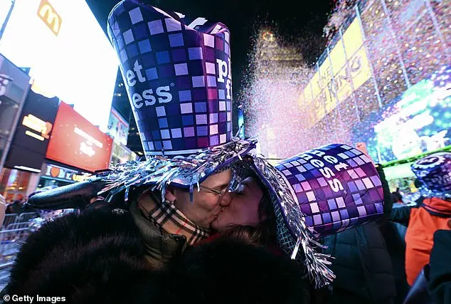 Festive Spirits Shine in Times Square as Thousands Celebrate New Year's Eve Amid Cold Temperatures