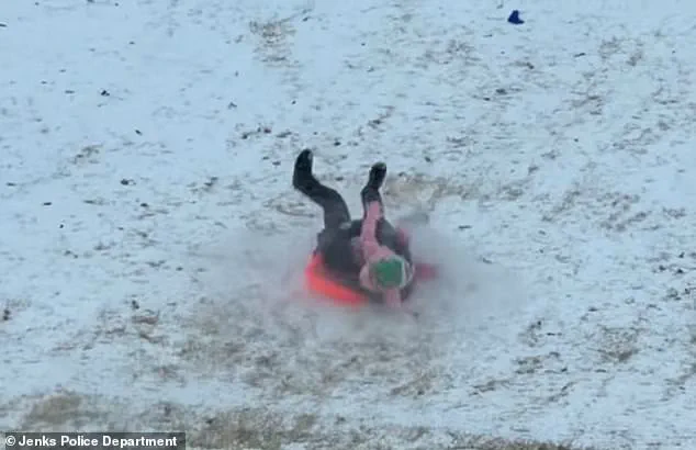 Viral Video Shows Oklahoma Police Officer Accidentally Sleds Into Child During Snow Day Chaos—Safety Message Emerges