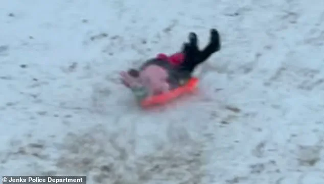 Viral Video Shows Oklahoma Police Officer Accidentally Sleds Into Child During Snow Day Chaos—Safety Message Emerges