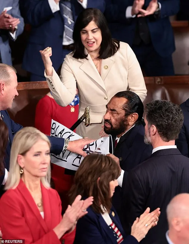 Tensions Boil Over as Texas Democrat Removed for Confronting Trump's AI Video Amid Nation's Deepening Divide