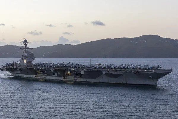 Iran Warns U.S. Carrier in Red Sea Poses Existential Threat, Declares Support Facilities as Targets