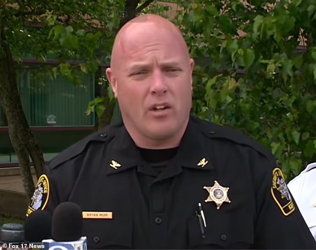 Michigan fire suspected as husband's murder-suicide plot kills him, injures wife.